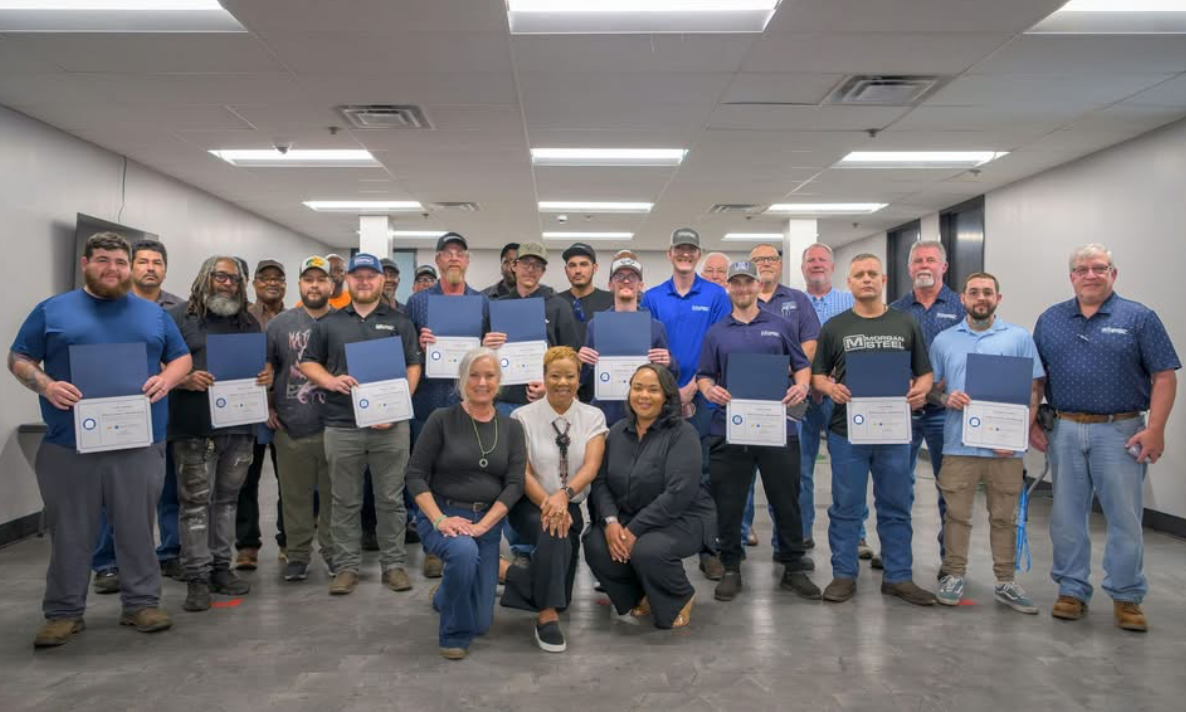 Manufacturing Skills for Success graduates holding their certificates of completion